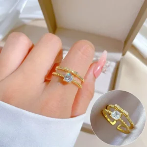 Bague dorée élégante avec zircon