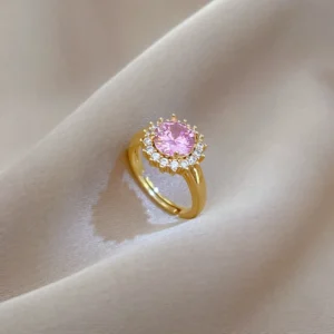 Bague dorée avec pierre rose